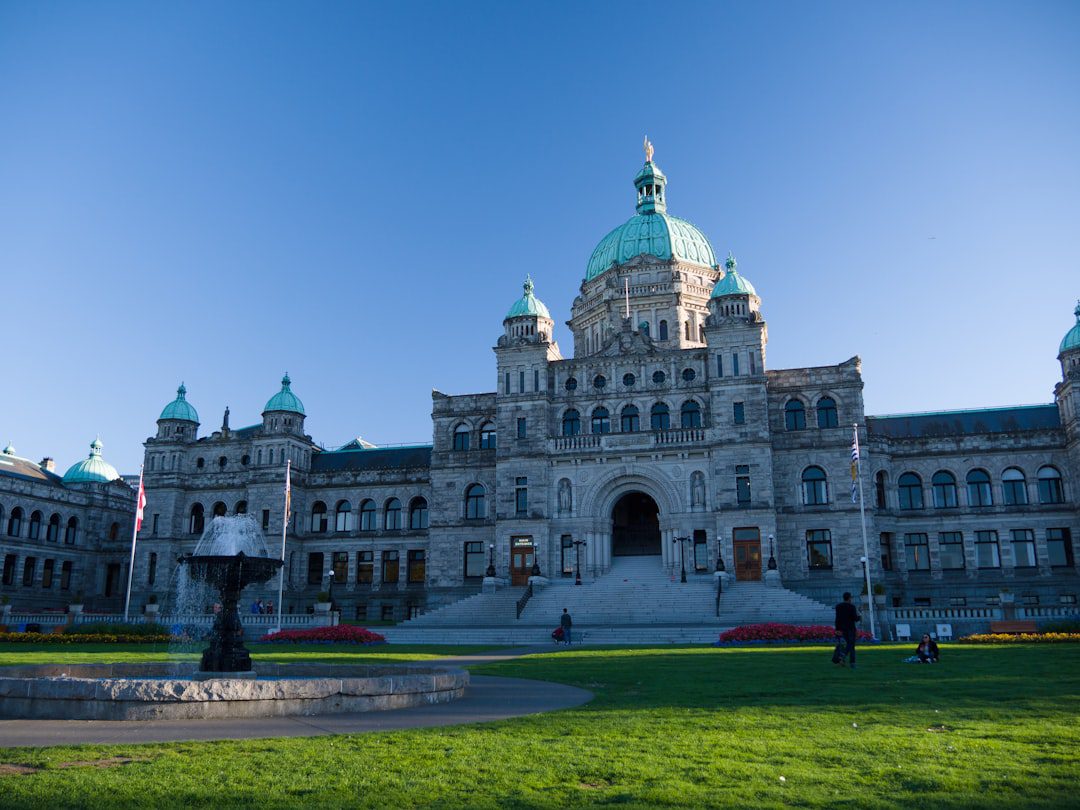 bilingual service dog — a large building with a fountain in front of it